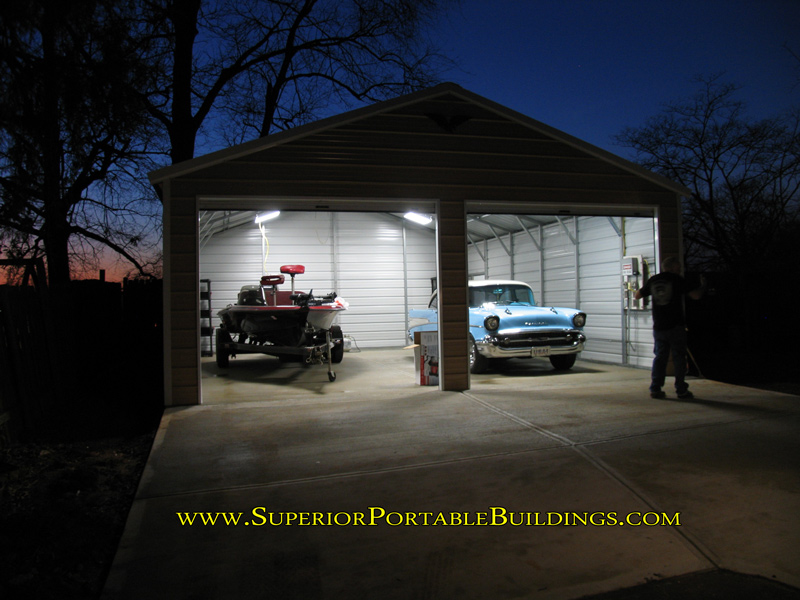 24 x 30 x 9 steel garage with the lights on