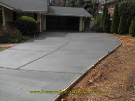 Replace your old asphalt driveway with concrete.
