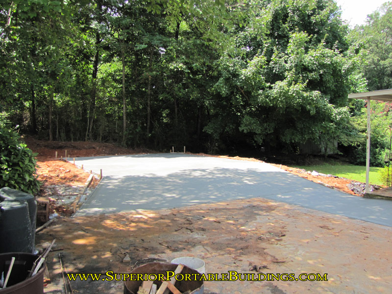 22' wide x 25' long concrete slab plus entrance ramp