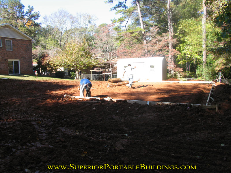 18 wide by 25 long concrete slab with gravel drive b