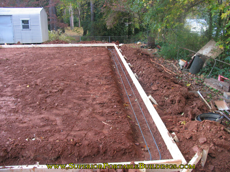 18 wide by 25 long concrete slab with gravel drive c