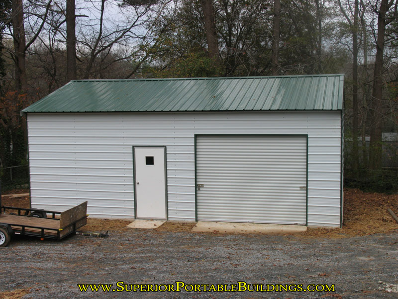 18 wide by 25 long concrete slab with gravel drive d