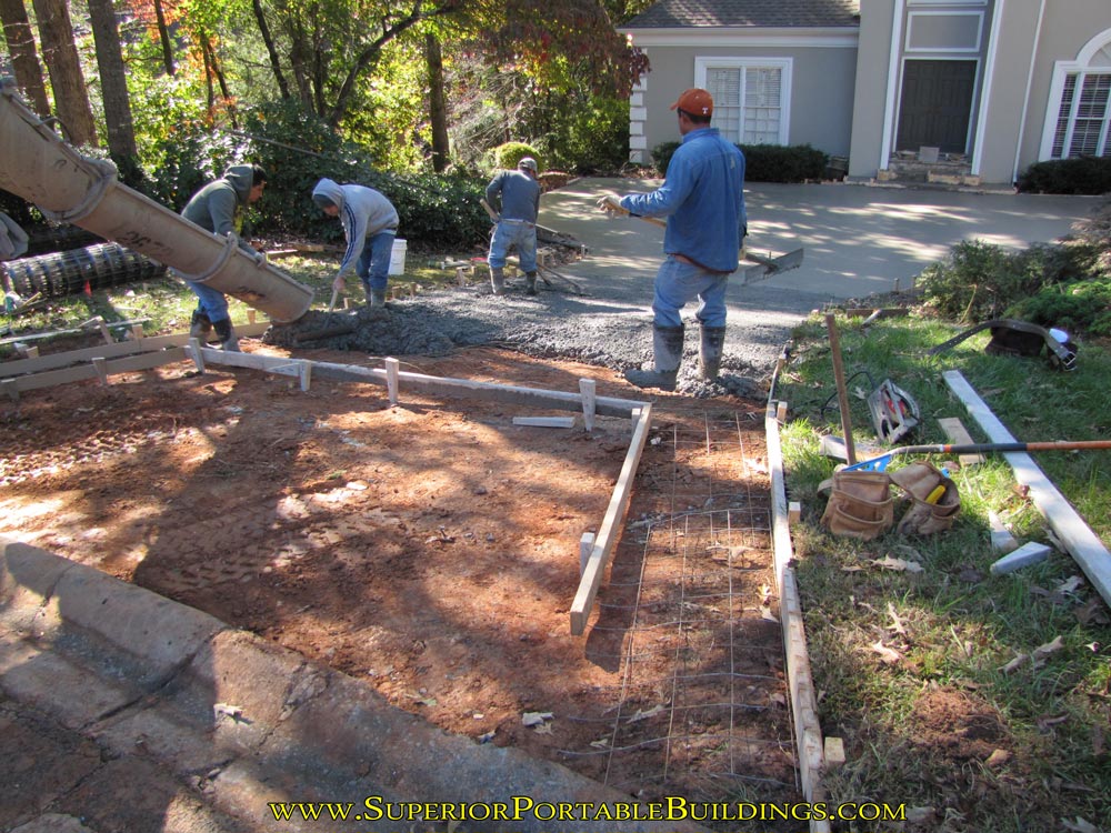 Pouring new concrete driveway.