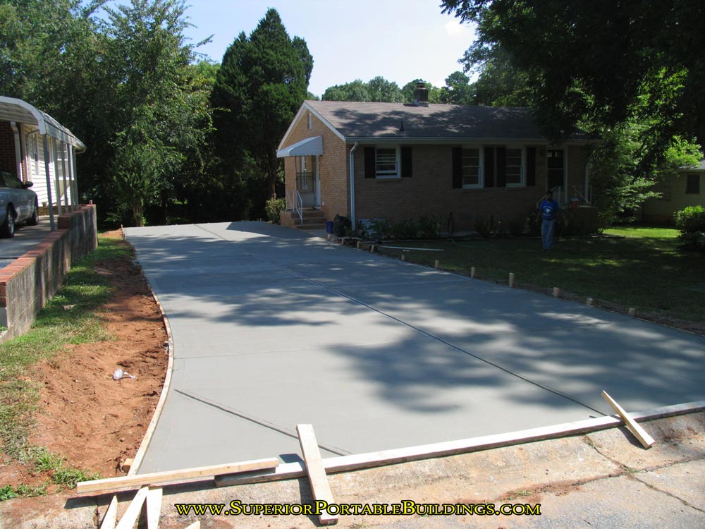 Final touches on concrete driveway.