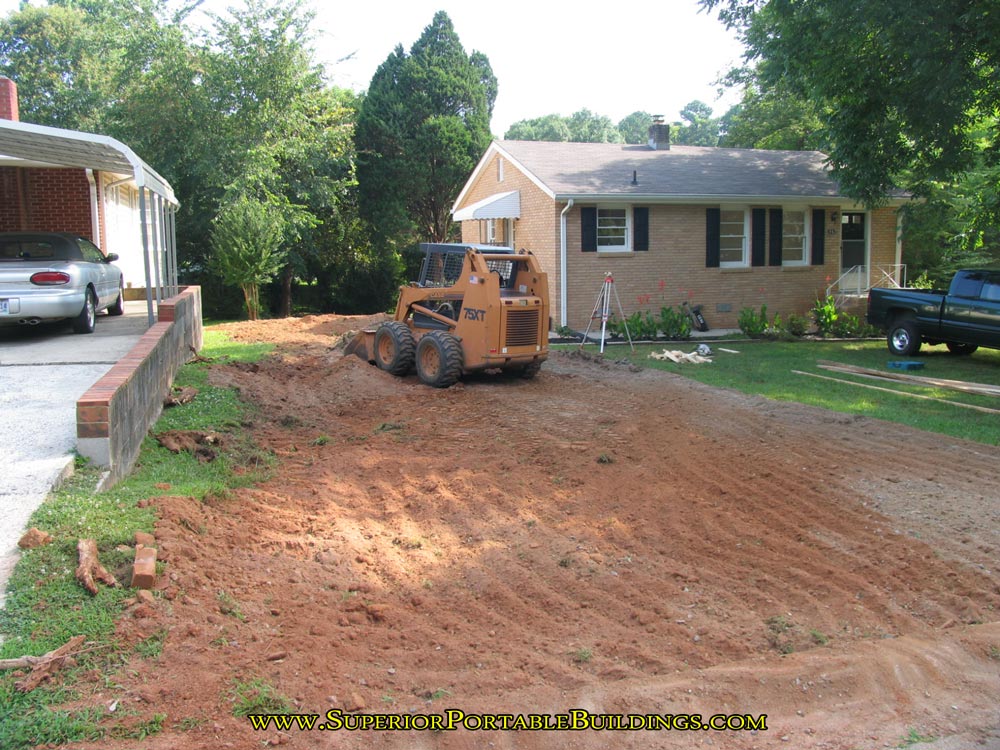 Grading for a 2 car concrete driveway.