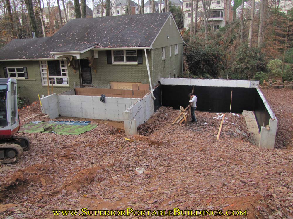 Walls poured water proofing applied and drainage installed.