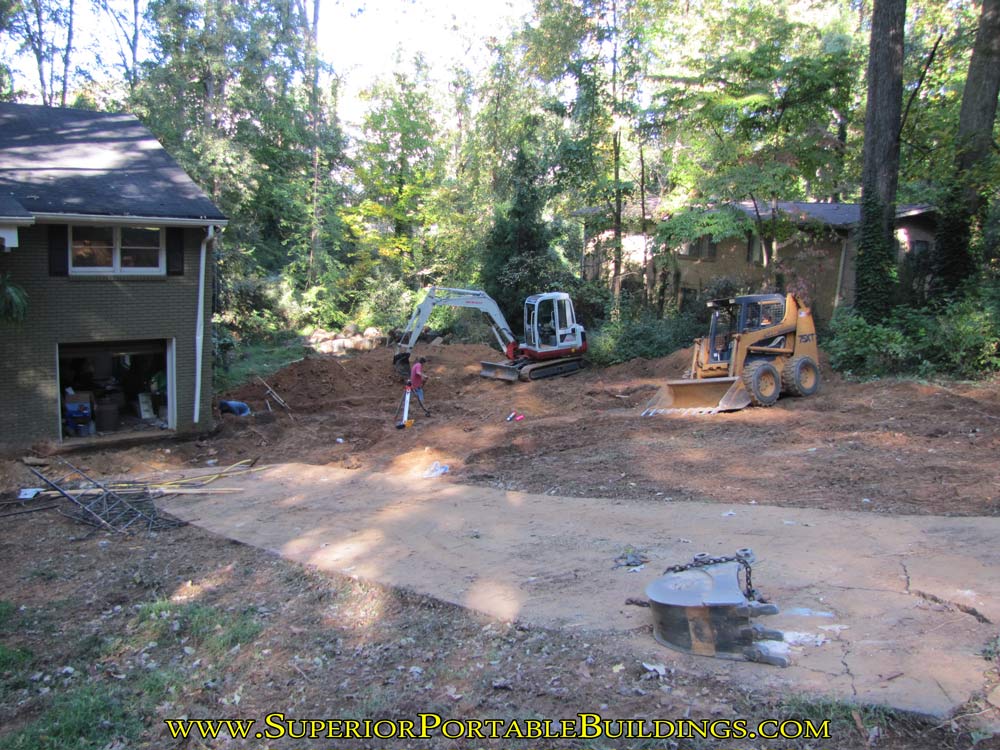 Removed the concrete parking area.