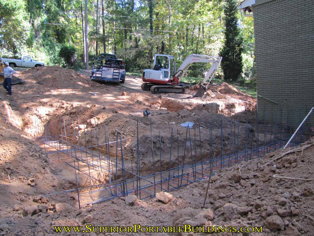 Setting steel rebar for footings and wall ties