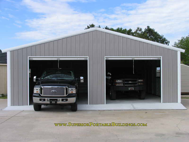 steel garage with trucks