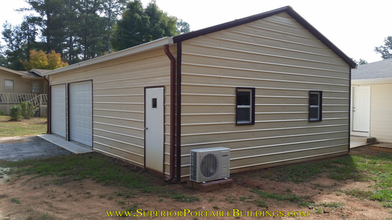 24 wide x 40 long x 10 high steel garage with side entry garage doors.